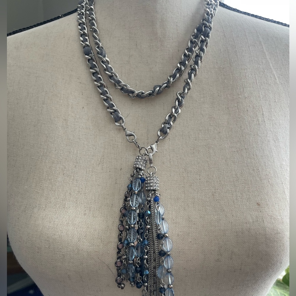 Lia Sophia adjustable length necklace. Blue leather wrapped chain. Tassels
